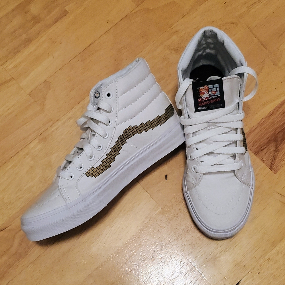 Vans White High-Tops with Gold Detailing